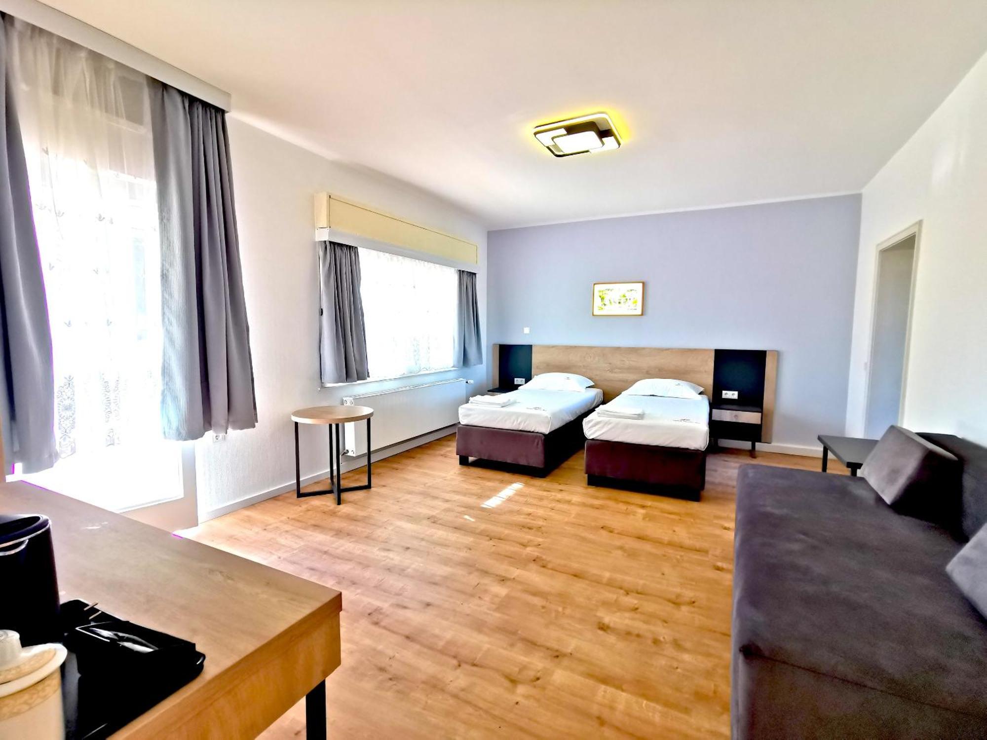 دورماغن Home Inn Hotel الغرفة الصورة