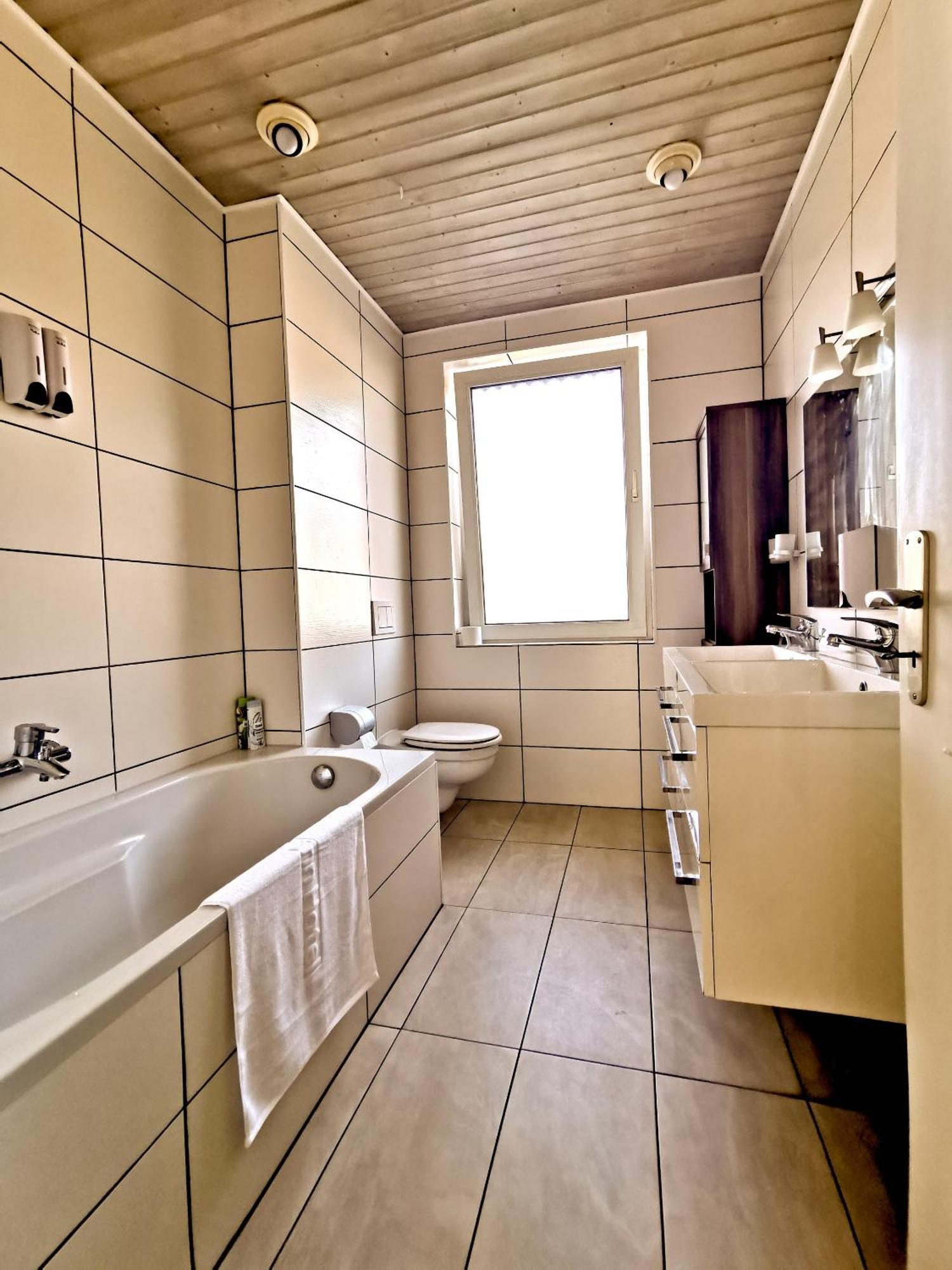 دورماغن Home Inn Hotel الغرفة الصورة